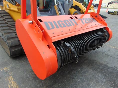 rock digger skid steer attachment|diggit skid steer attachments.